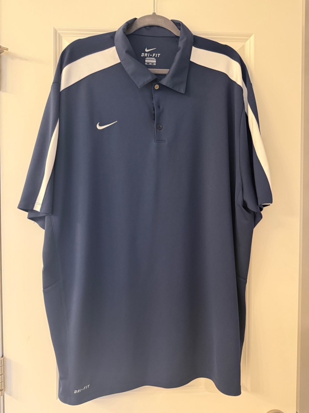 Nike Men's Navy Blue Polo with White Shoulder Stripes